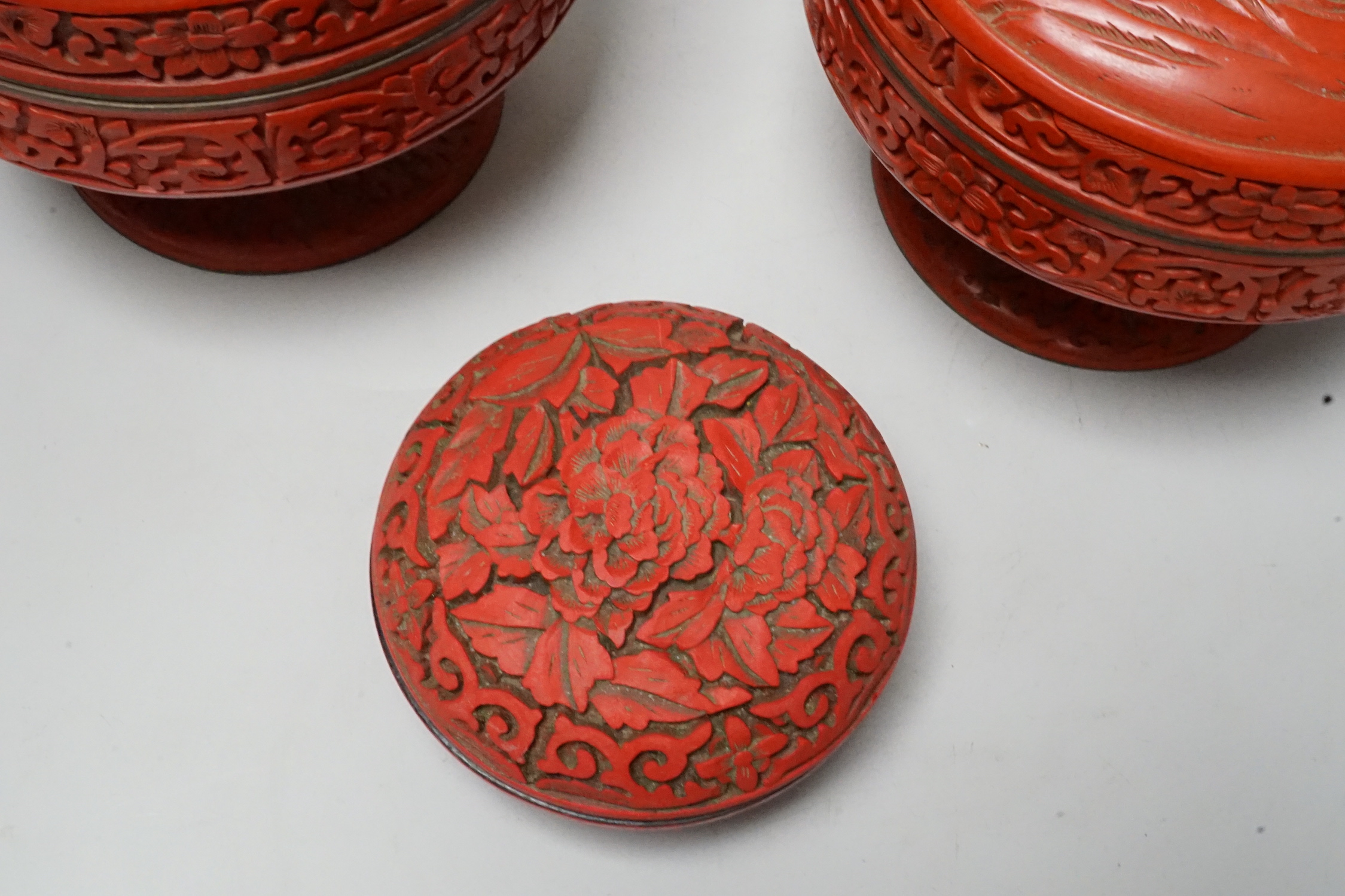 Two Chinese red lacquer stem dishes and covers and another box